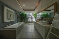 Hoe je je badkamer een moderne make-over geeft